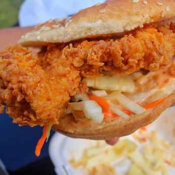 Thyme Traveling - a chicken sandwich with coleslaw and coleslaw slaw - Food Trucks Near Me
