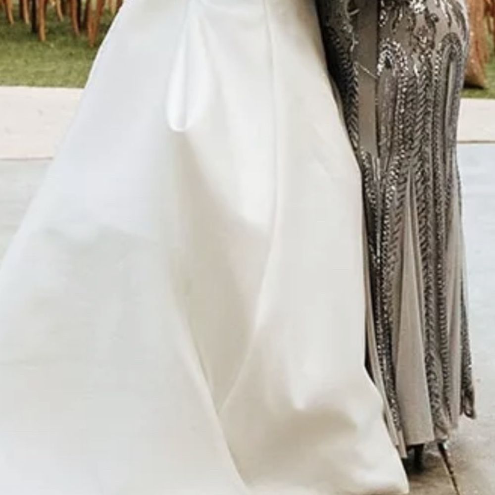 Legacy Tailor - Bustle detached while I dance with my mom, notice length of dress in the front too low to the ground - Sewing & Alterations Near Me - Plano, Texas Legacy Tailor - Bustle detached while I dance with my mom, notice length of dress in the front too low to the ground - Sewing & Alterations Near Me - Plano, Texas