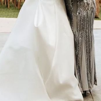 Legacy Tailor - Bustle detached while I dance with my mom, notice length of dress in the front too low to the ground - Sewing & Alterations Near Me - Plano, Texas