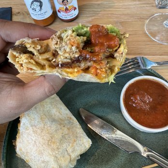 Waterbury Restaurant - The Wagyu Burrito with side sauce. - Breakfast & Brunch Near Me - Minneapolis, Minnesota Waterbury Restaurant - The Wagyu Burrito with side sauce. - Breakfast & Brunch Near Me - Minneapolis, Minnesota