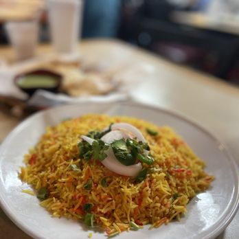 Sheesh Mahal - a plate of food on a table - Indian Near Me - Oklahoma City, Oklahoma