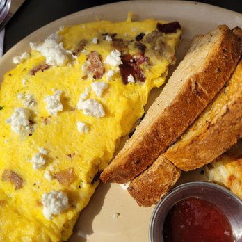 Snooze, an A.M. Eatery - 3 egg omelet with bacon, sausage and goat cheese...very dry. - Breakfast & Brunch Near Me - Westminster, Colorado Snooze, an A.M. Eatery - 3 egg omelet with bacon, sausage and goat cheese...very dry. - Breakfast & Brunch Near Me - Westminster, Colorado
