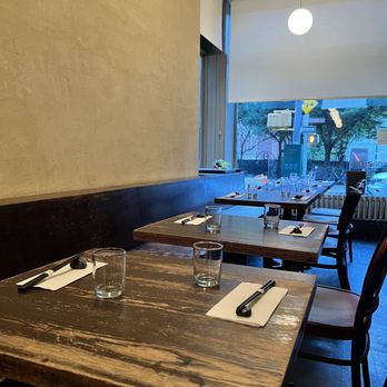 Hibino - empty tables in a restaurant with a large window - Japanese Near Me - Brooklyn, New York Hibino - empty tables in a restaurant with a large window - Japanese Near Me - Brooklyn, New York