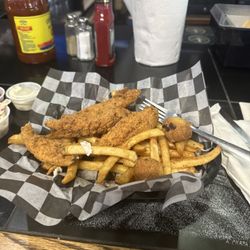 Salty Dog - They have an amazing catfish basket And i love their hushpuppies The ladies here are top notch Best bar serviceinWacp
