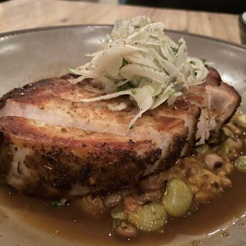 Husk - Pork Chop with stewed beans and fennel - American Near Me - Charleston, South Carolina Husk - Pork Chop with stewed beans and fennel - American Near Me - Charleston, South Carolina