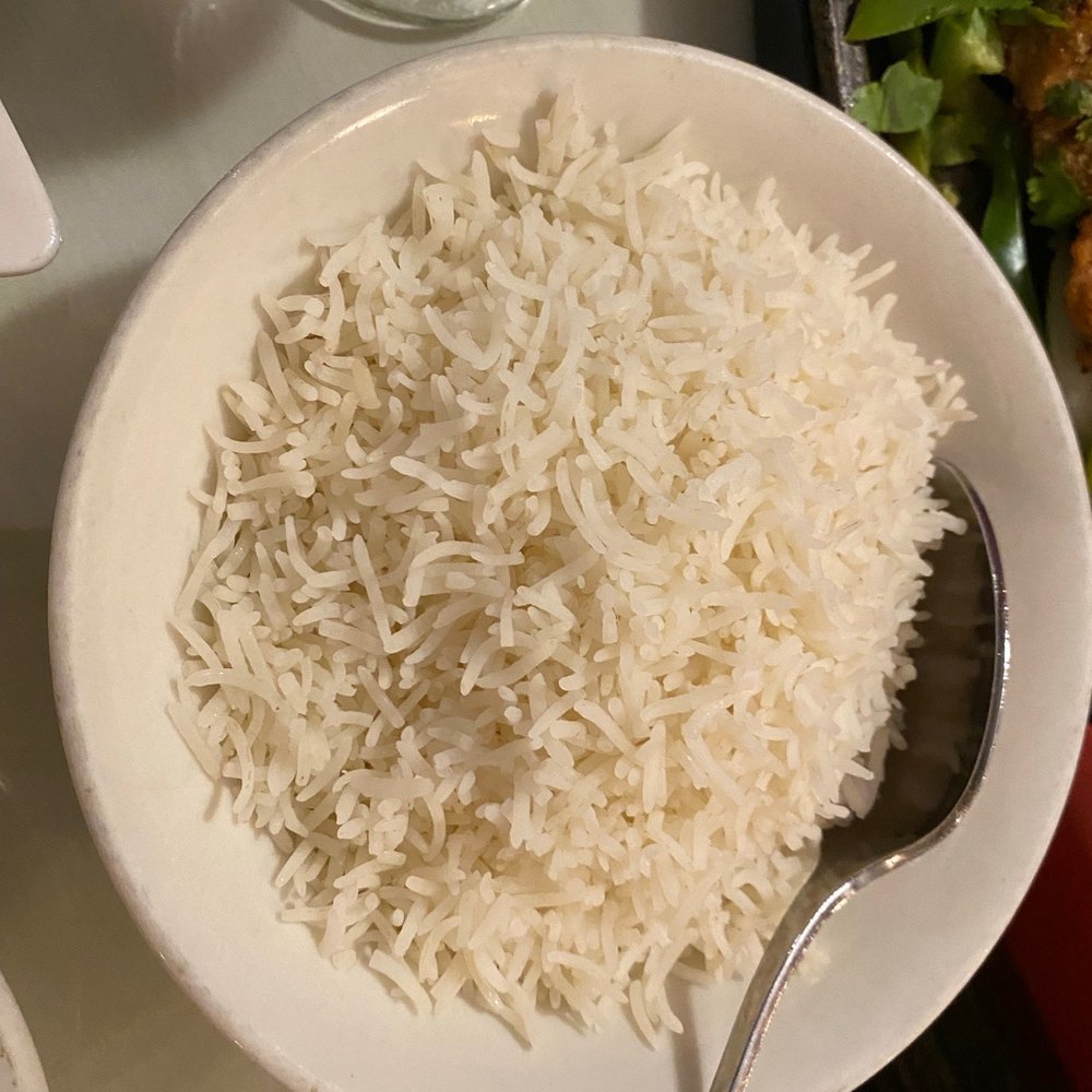 Namaste India - a bowl of rice and a plate of vegetables - Indian Near Me - Southington, Connecticut Namaste India - a bowl of rice and a plate of vegetables - Indian Near Me - Southington, Connecticut