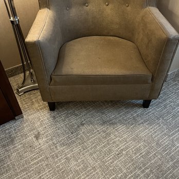 The Delavan Hotel - Stained chair in room - Hotels Near Me - Buffalo, New York The Delavan Hotel - Stained chair in room - Hotels Near Me - Buffalo, New York