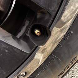 Mavis Discount Tire - New tires. 3/4 tire caps missing.