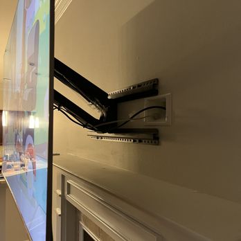 Modern Home Solutions - Articulating TV bracket and receptacle install - Electricians Near Me Modern Home Solutions - Articulating TV bracket and receptacle install - Electricians Near Me