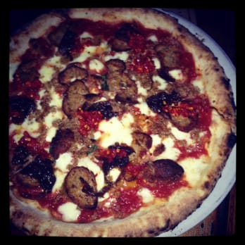 Cane Rosso - OMB pizza. Sausage, meatballs, peppers, caramelized onions. - Italian Near Me - Dallas, Texas Cane Rosso - OMB pizza. Sausage, meatballs, peppers, caramelized onions. - Italian Near Me - Dallas, Texas
