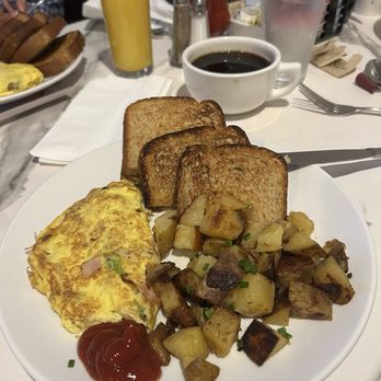Biscotti Brothers Cafe - Western omelette, home fries, wheat toast - Breakfast & Brunch Near Me - Lake George, New York Biscotti Brothers Cafe - Western omelette, home fries, wheat toast - Breakfast & Brunch Near Me - Lake George, New York