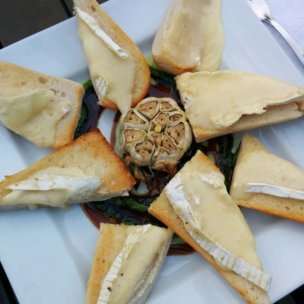 Sweet Onion Bistro - Roasted garlic and brie. Surprise winner! Gooey delicious bread - Breakfast & Brunch Near Me - London, Ontario Sweet Onion Bistro - Roasted garlic and brie. Surprise winner! Gooey delicious bread - Breakfast & Brunch Near Me - London, Ontario