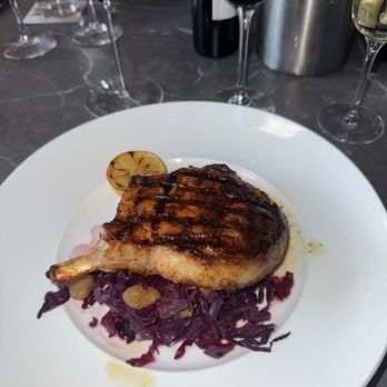 Seasons 52 - Pork chop with red cabbage and grapes - New American Near Me - Costa Mesa, California
