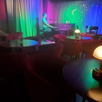Faith & Spirits - Seating in between 2 pianos - Wine Bars Near Me - San Carlos, California