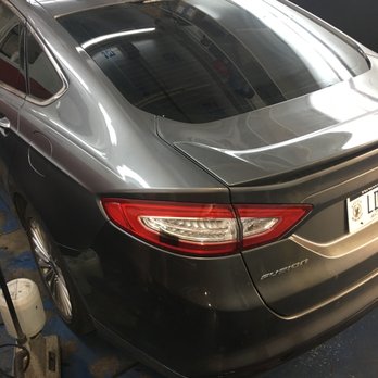 Tinting Chicago - Harlem - Showing me different light percentages for taillight smoke - Vehicle Wraps Near Me - Chicago, Illinois