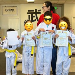 National Tae Kwon Do Center - Earning their yellow belts! Thanks Master Soo!