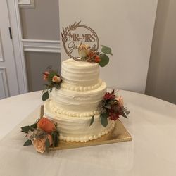 Century Bakery - Three tiers of our classic cake covered and decorated with our famous buttercream