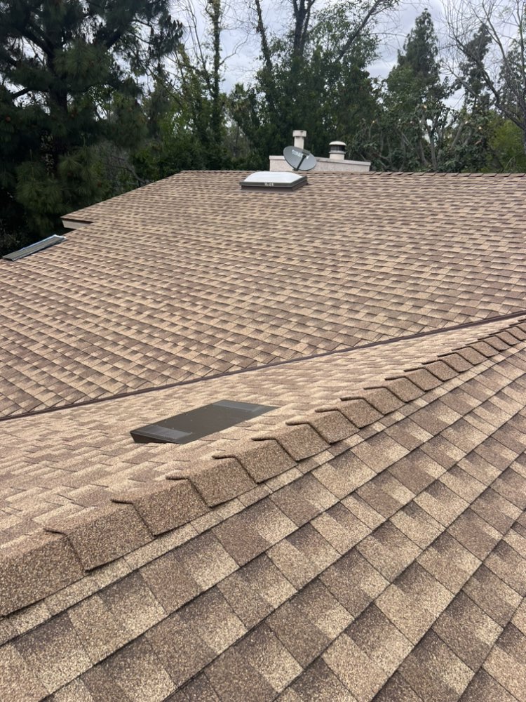 Slide of JVR Quality Roofing