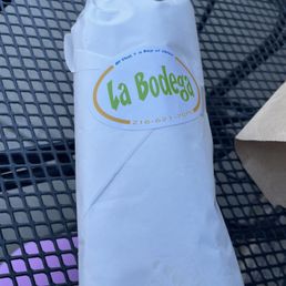 My wrapped sandwich at the table outside. 45- southwest turkey sub