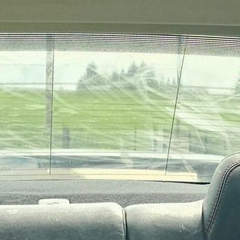 Solar Vision Window Tint - Marks across window where they tried to scrape or scrub off adhesive - Home Window Tinting Near Me - Portland, Oregon Solar Vision Window Tint - Marks across window where they tried to scrape or scrub off adhesive - Home Window Tinting Near Me - Portland, Oregon