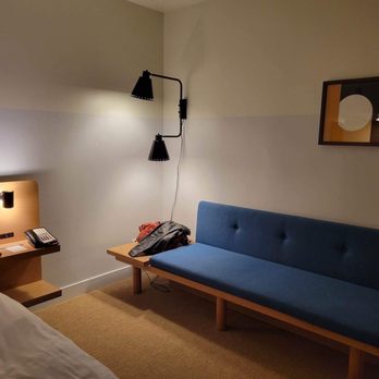 Hotel June - Couch by the tv - Hotels Near Me - Los Angeles, California Hotel June - Couch by the tv - Hotels Near Me - Los Angeles, California