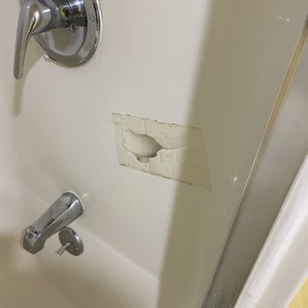 Oceanfront Vacation Rentals - Hole in the shower with clear tape! - Vacation Rentals Near Me - Myrtle Beach, South Carolina