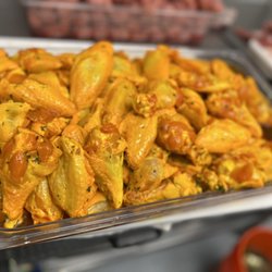 Vitoria international meat market - Seasoning wings with yellow sauce