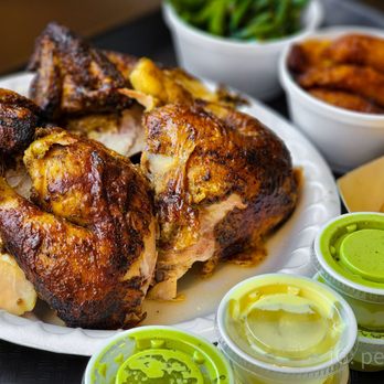 El Pollon II - a plate of roasted chicken and sides - Peruvian Near Me - Morgantown, West Virginia