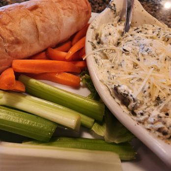 Parkway Bar & Grill - Spinach artichoke dip- served with carrots, celery and toasted baguette bread - New American Near Me - Aurora, Colorado