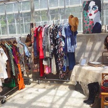 Lazy Eye Shop - Owner with clothing at one of her pop-ups (photo credit to business website) - Used, Vintage & Consignment Near Me - Goleta, California Lazy Eye Shop - Owner with clothing at one of her pop-ups (photo credit to business website) - Used, Vintage & Consignment Near Me - Goleta, California