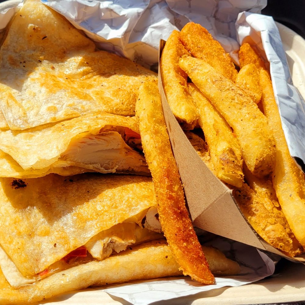Smoked chicken quesadilla w/Mama Lil's peppers and bacon. Yummy fries! Smoked chicken quesadilla w/Mama Lil's peppers and bacon. Yummy fries!