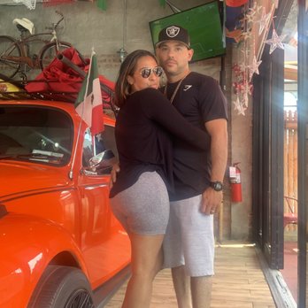 Nacho Macho Taco - Hubby and I - in front of that car - which is i parked in restaurant-super cute - Mexican Near Me - Brooklyn, New York