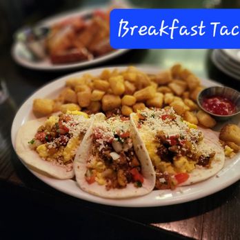 Summit Grill - a plate of tacos and tater tots - Bars Near Me - Kansas City, Missouri Summit Grill - a plate of tacos and tater tots - Bars Near Me - Kansas City, Missouri