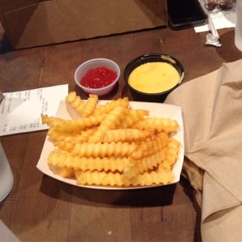 Shake Shack River North - Cheese fries (crinkle cut fries with side of cheese sauce) - Burgers Near Me - Chicago, Illinois Shake Shack River North - Cheese fries (crinkle cut fries with side of cheese sauce) - Burgers Near Me - Chicago, Illinois