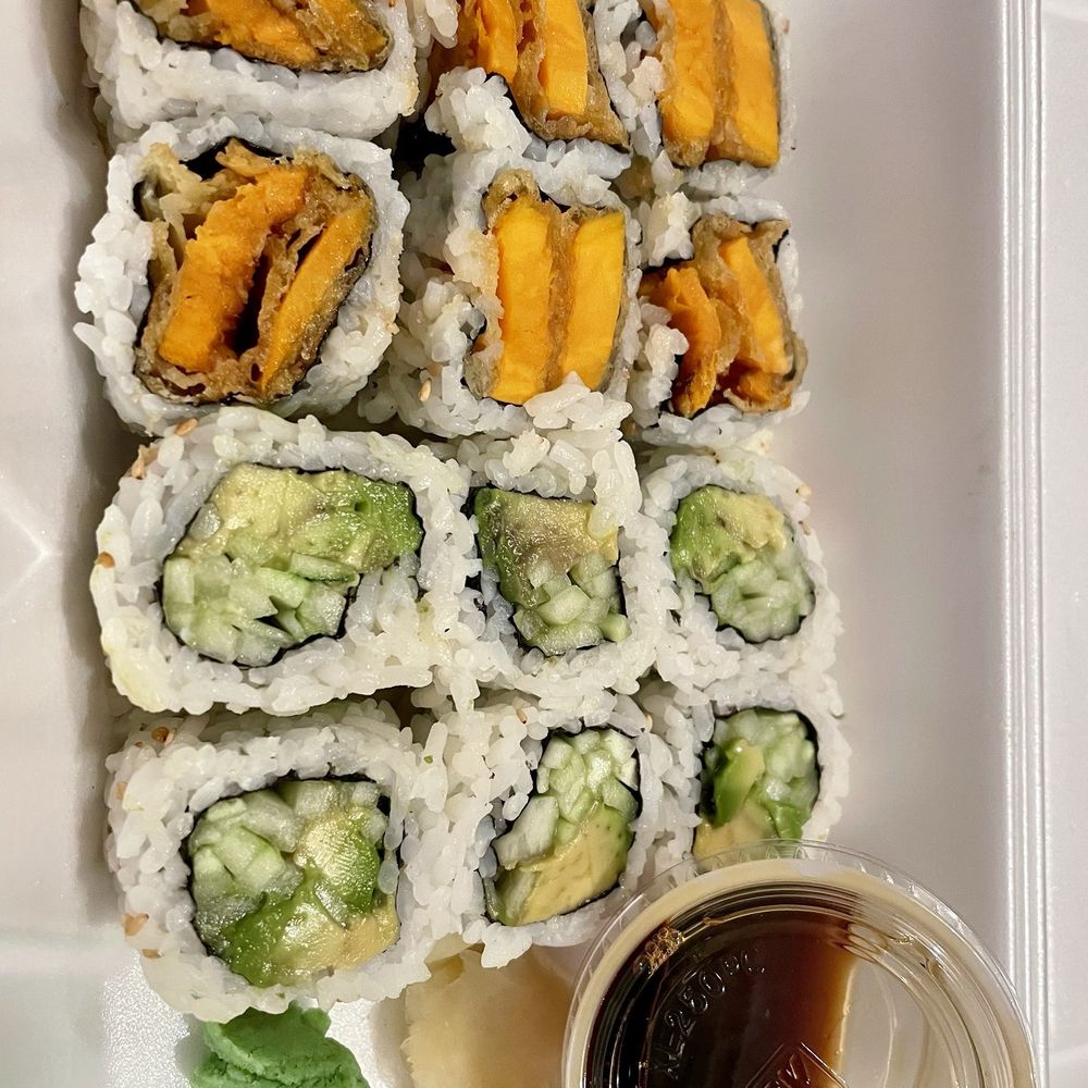 Okinawa Sushi & Grill - Rolls to go - Sweet Potato Roll (top/orange colored) $5.50 and Avo + Cucumber Roll $5.50 - Japanese Near Me - Corolla, North Carolina