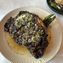 Currents Restaurant - Special of the evening! Ribeye with porchinni rub and bone marrow reduction. Excellent flavor and the service with Cami, impeccable.