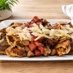 Make your table delicious! Our Parrillada Tray is loaded with ribs, chicken, pork chunks & sausage. Perfect for sharing!