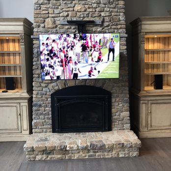 OddityTVandSound - 65" TV mounted above fireplace "Drop down and out " mount for easier viewing - TV Mounting Near Me - Doylestown, Pennsylvania OddityTVandSound - 65" TV mounted above fireplace "Drop down and out " mount for easier viewing - TV Mounting Near Me - Doylestown, Pennsylvania