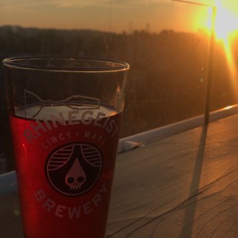 Rhinegeist Brewery - Rhinegeist Bubbles and a great view of a Cincinnati sunset on the rooftop. - Breweries Near Me - Cincinnati, Ohio