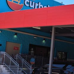 H-E-B - Curbside Labeled on the side of the HEB Grocery Store