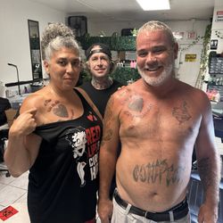 The NY Tattoo Gallery - Wife and I with another shop artist who tattooed us as well