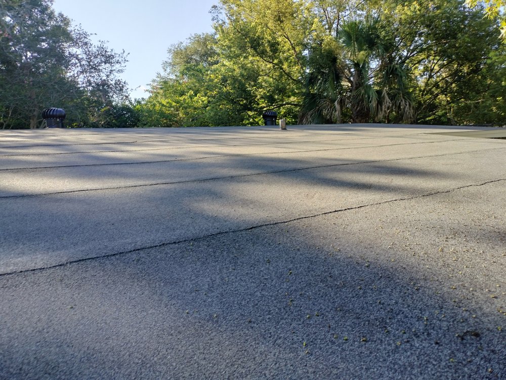 Slide of Land Roofing Company