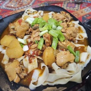 New Nurlan Restaurant - DaPanJi/Big Plate Chicken. Small size for $25.50. Excellent. Best of the mains - Soup Near Me - Flushing, New York