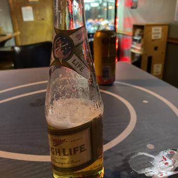 The Rook Pub - a bottle of beer on a table - Pubs Near Me - Indianapolis, Indiana