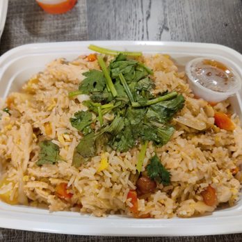 SriPraPhai Thai Restaurant - Pineapple fried rice with chicken - Thai Near Me - Woodside, New York