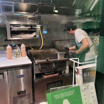 Panda Sal's - Chef cooking - Burgers Near Me - Bellflower, California Panda Sal's - Chef cooking - Burgers Near Me - Bellflower, California