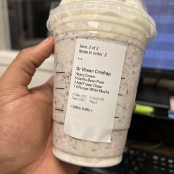 Starbucks - a hand holding a cup of coffee - Coffee & Tea Near Me - Temecula, California