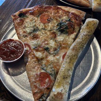The Post - Slice of the day with a breadstick - Pizza Near Me - Louisville, Kentucky