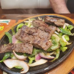 This was ridiculous for steak fajitas nothing like last ones. Raw peppers and onions and no tomatoes.. This was ridiculous for steak fajitas nothing like last ones. Raw peppers and onions and no tomatoes..