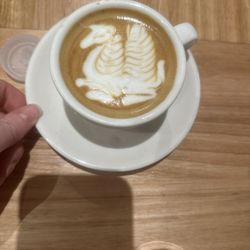 ONA Coffee - Aspen flat white with a unicorn